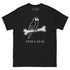 Camiseta Stay Calm negra con loro y hueso, diseño discreto y bordado frontal.